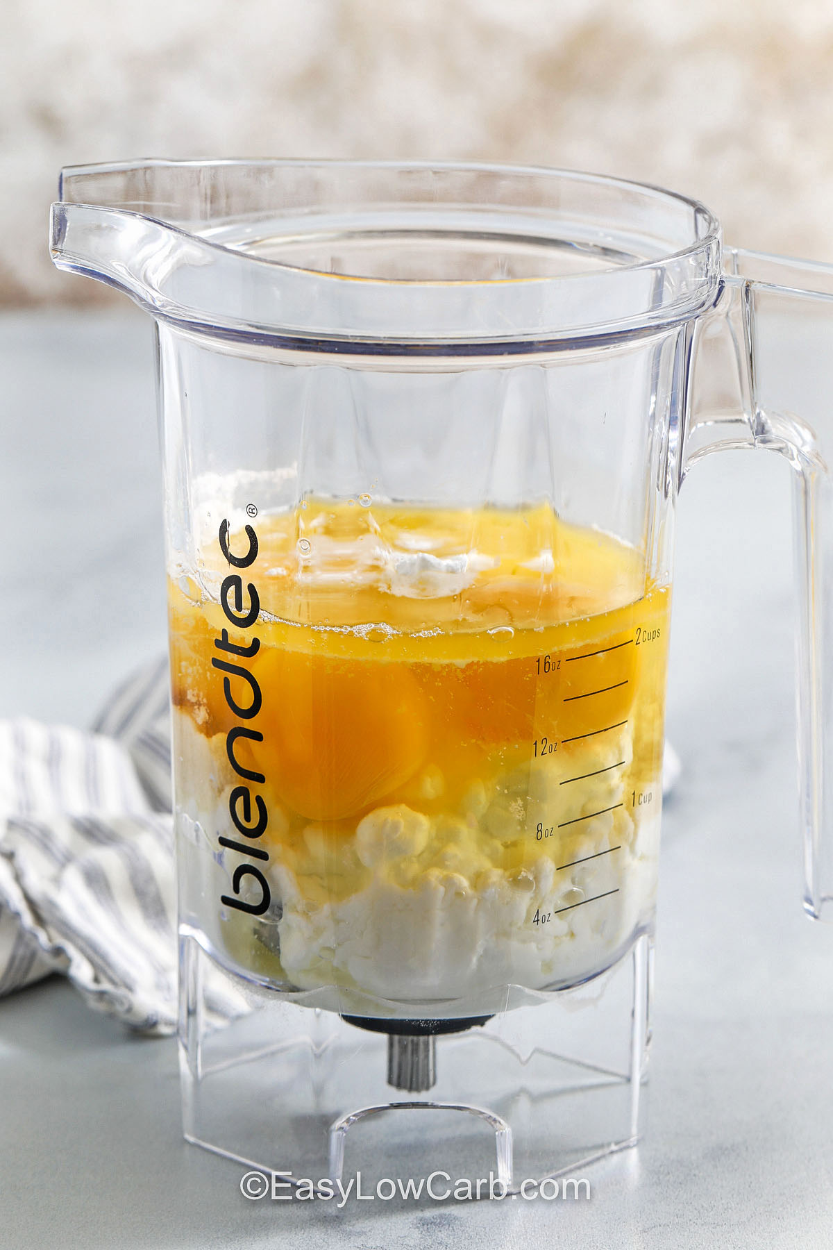adding ingredients to blender to make Cottage Cheese Pancakes Recipe