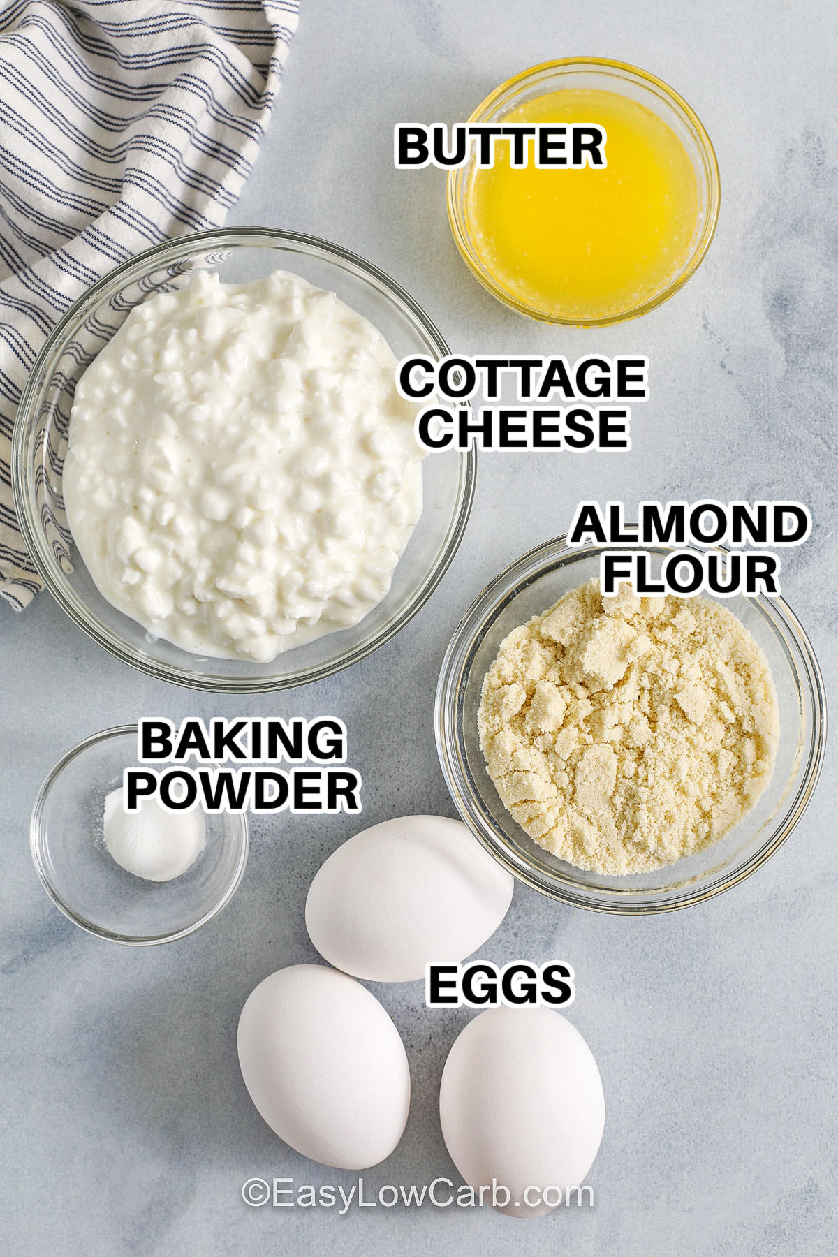 butter, cottage cheese, almond flour, baking powder, and eggs with labels to make Cottage Cheese Pancakes Recipe