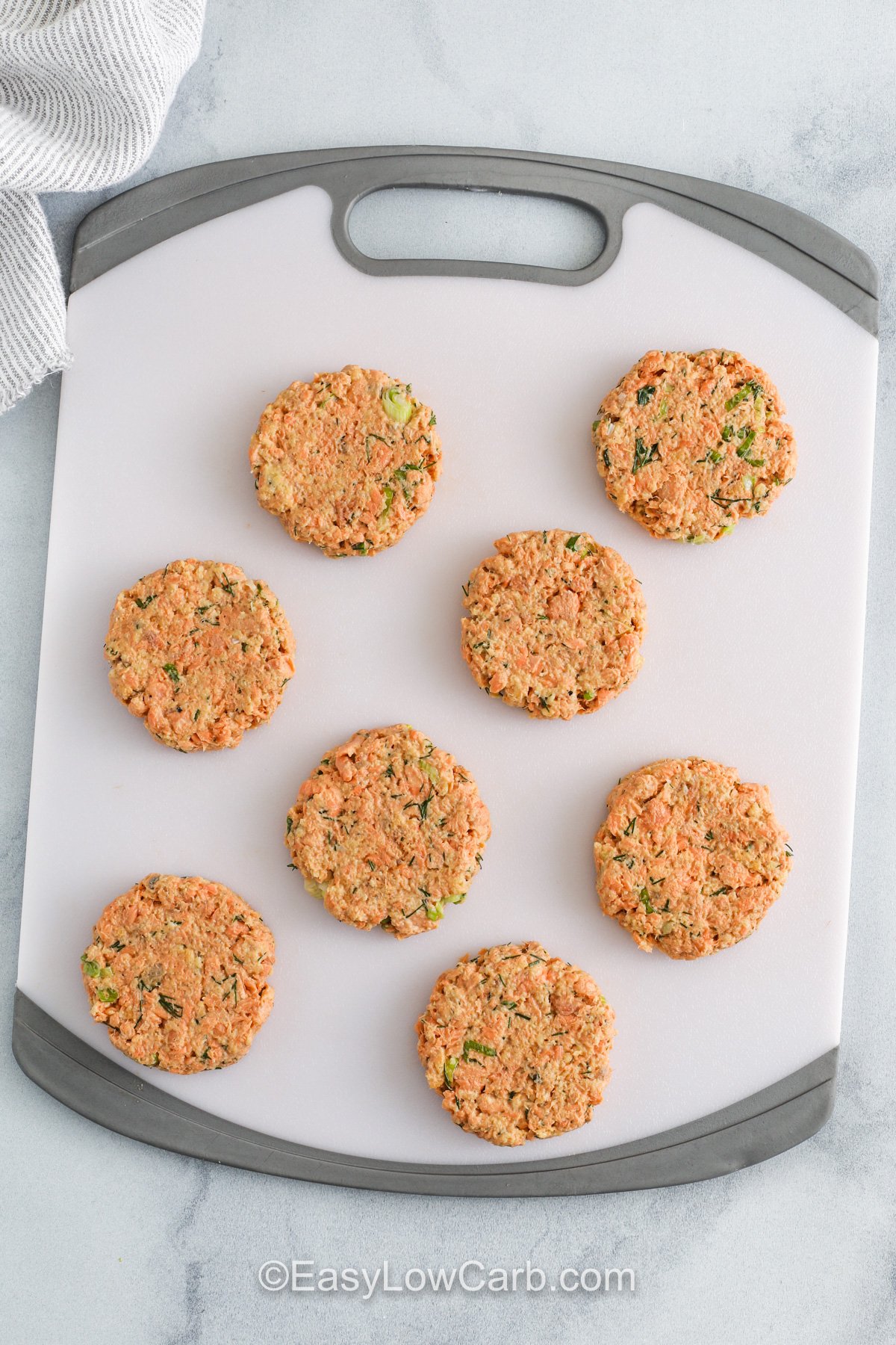 Keto Salmon Patties on a baking sheet before cooking