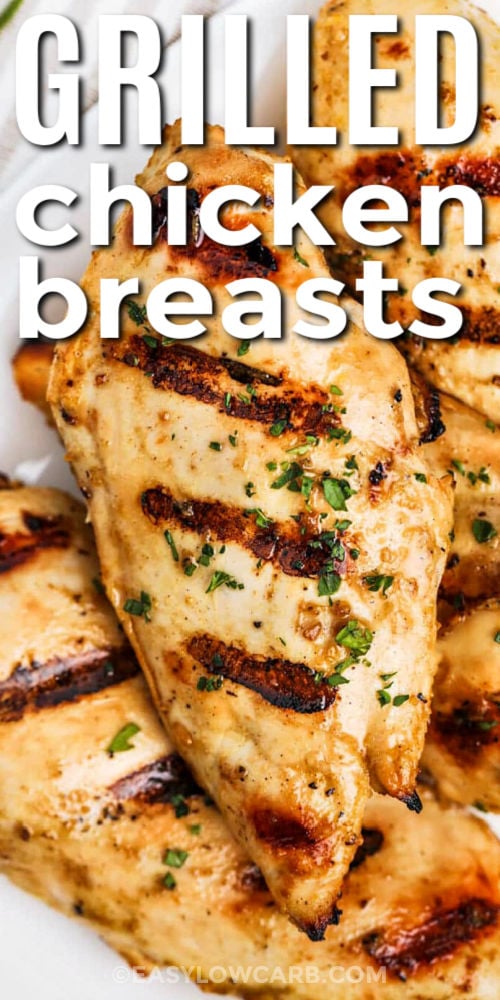 close up of Grilled Chicken Breasts on a plate with a title