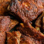 close up of Oven Baked Ribs Recipe with a title