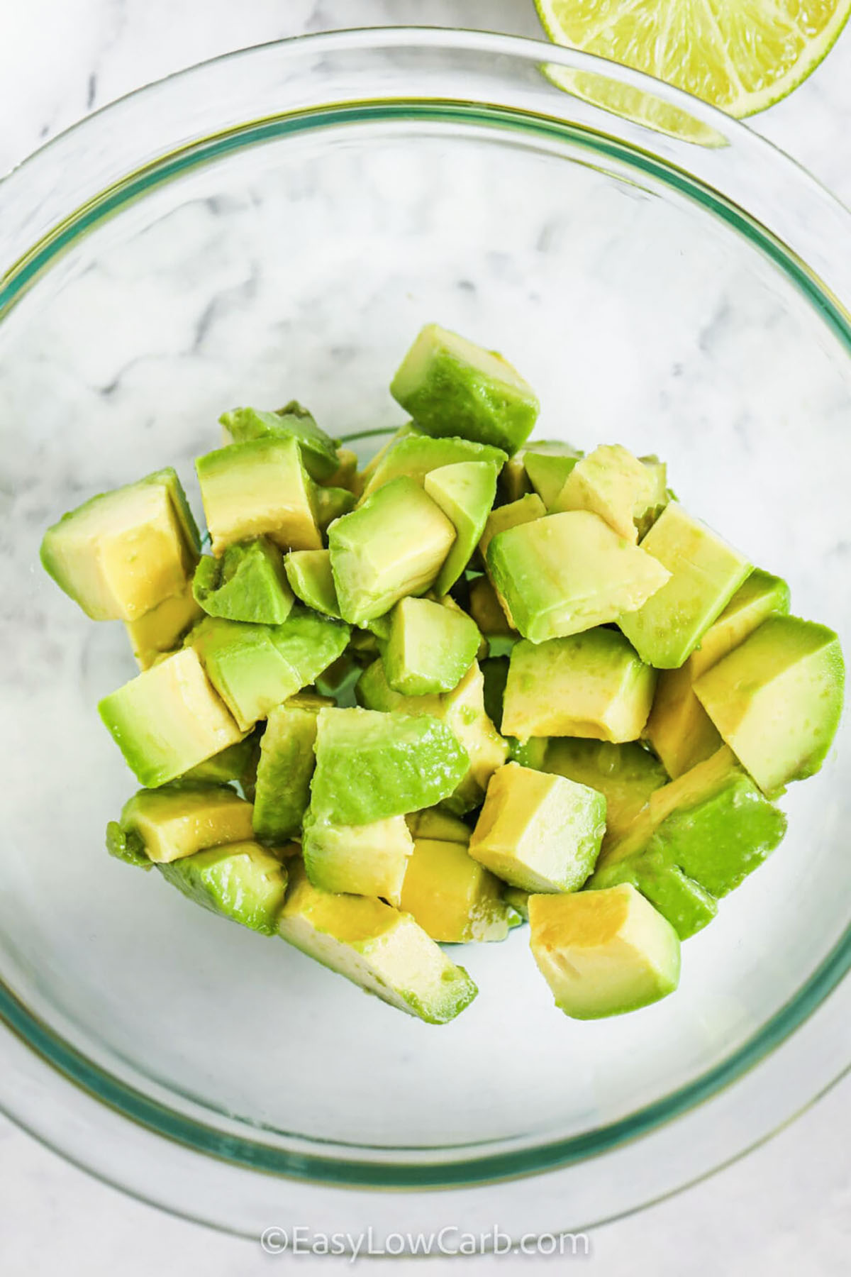 avocado in a bowl to make Avocado Salsa
