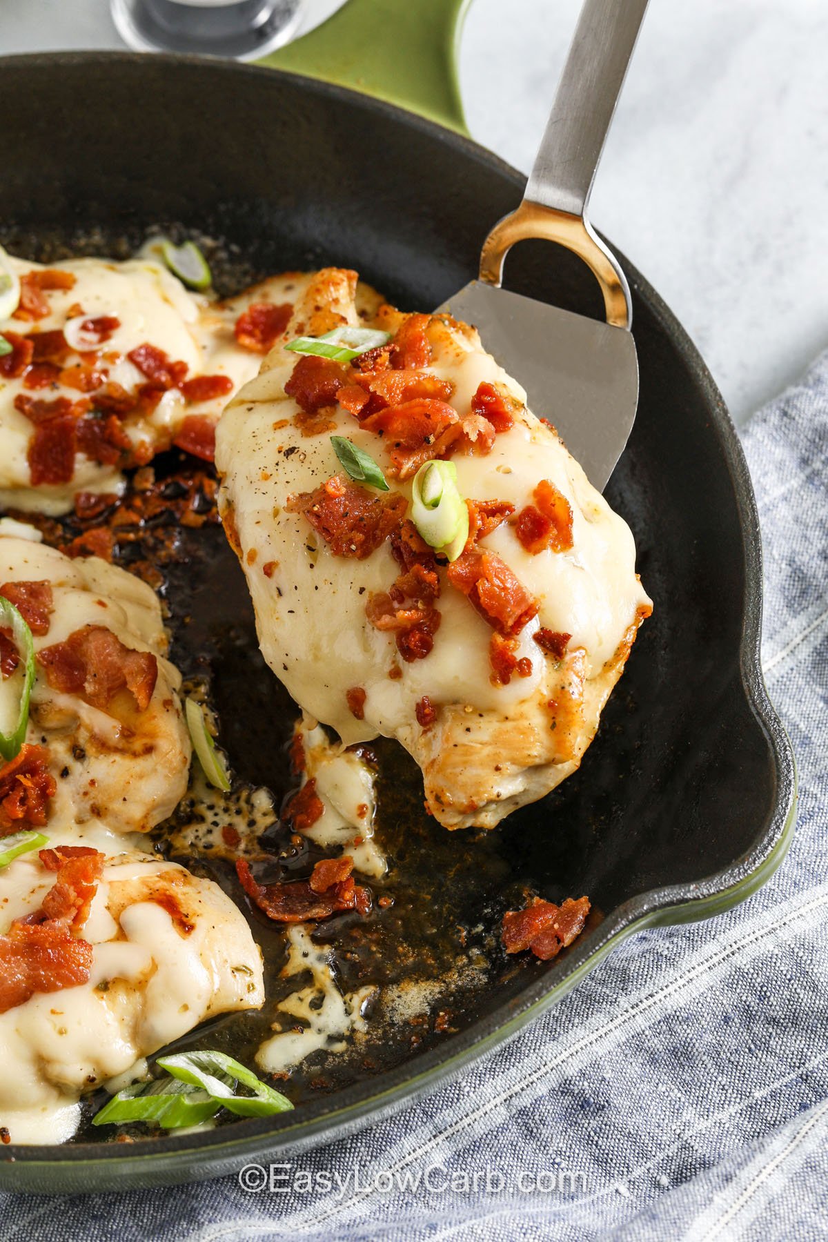 taking Bacon Ranch Chicken out of a pan