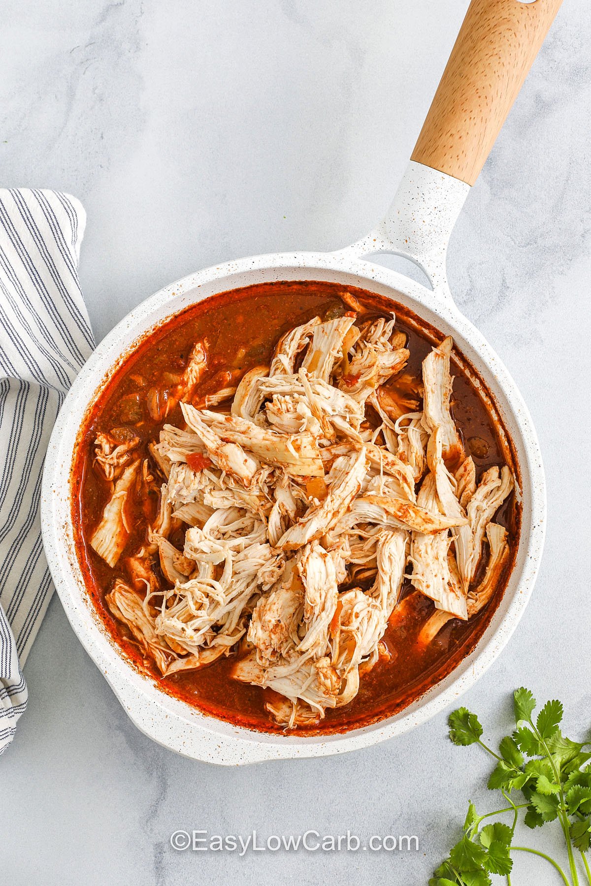 adding chicken to sauce to make Recipe for Chicken Tacos
