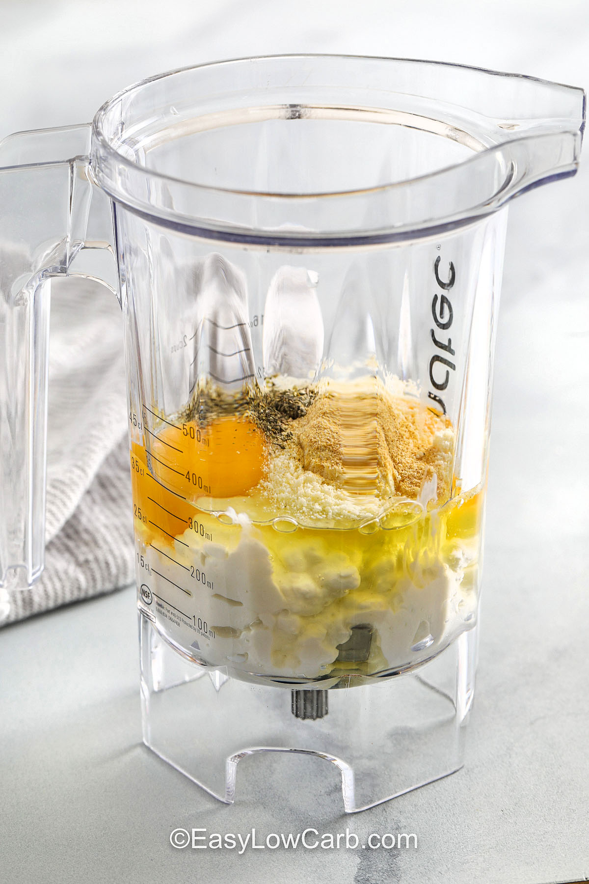 blender with ingredients to make crust for Cottage Cheese Pizza