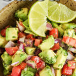 fresh Avocado Salsa in a bowl with a title