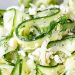 cucumber feta salad in a bowl with text