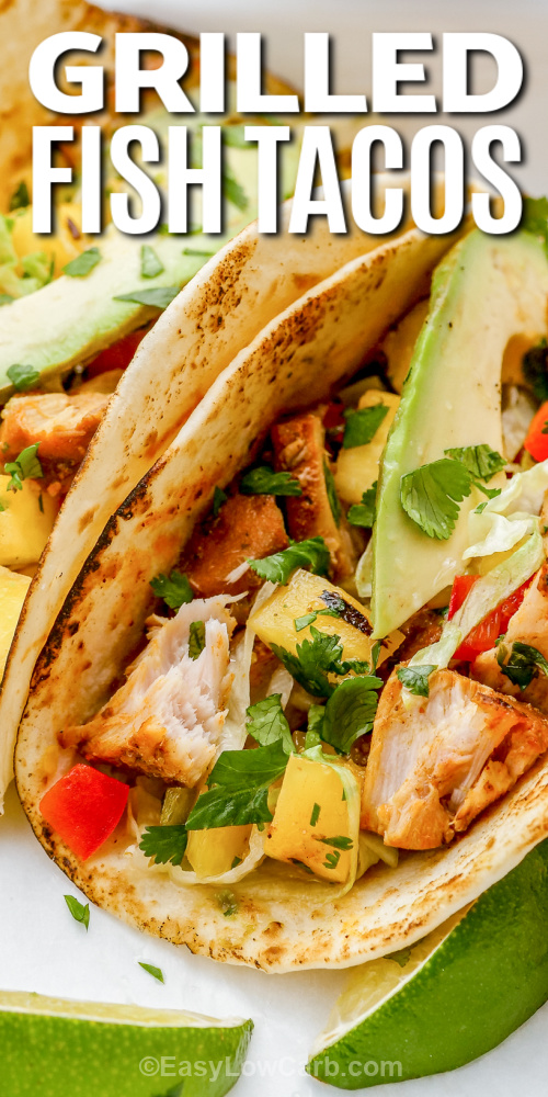 grilled fish tacos topped with cilantro with text