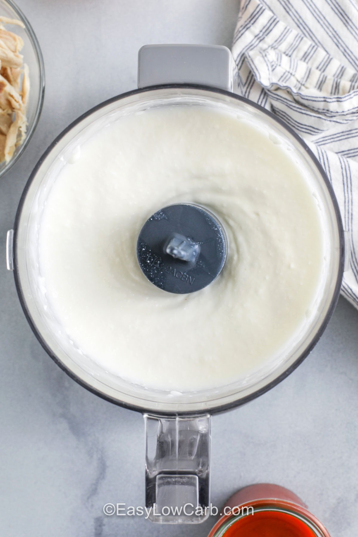 blending cottage cheese to make Cottage Cheese Buffalo Chicken Dip