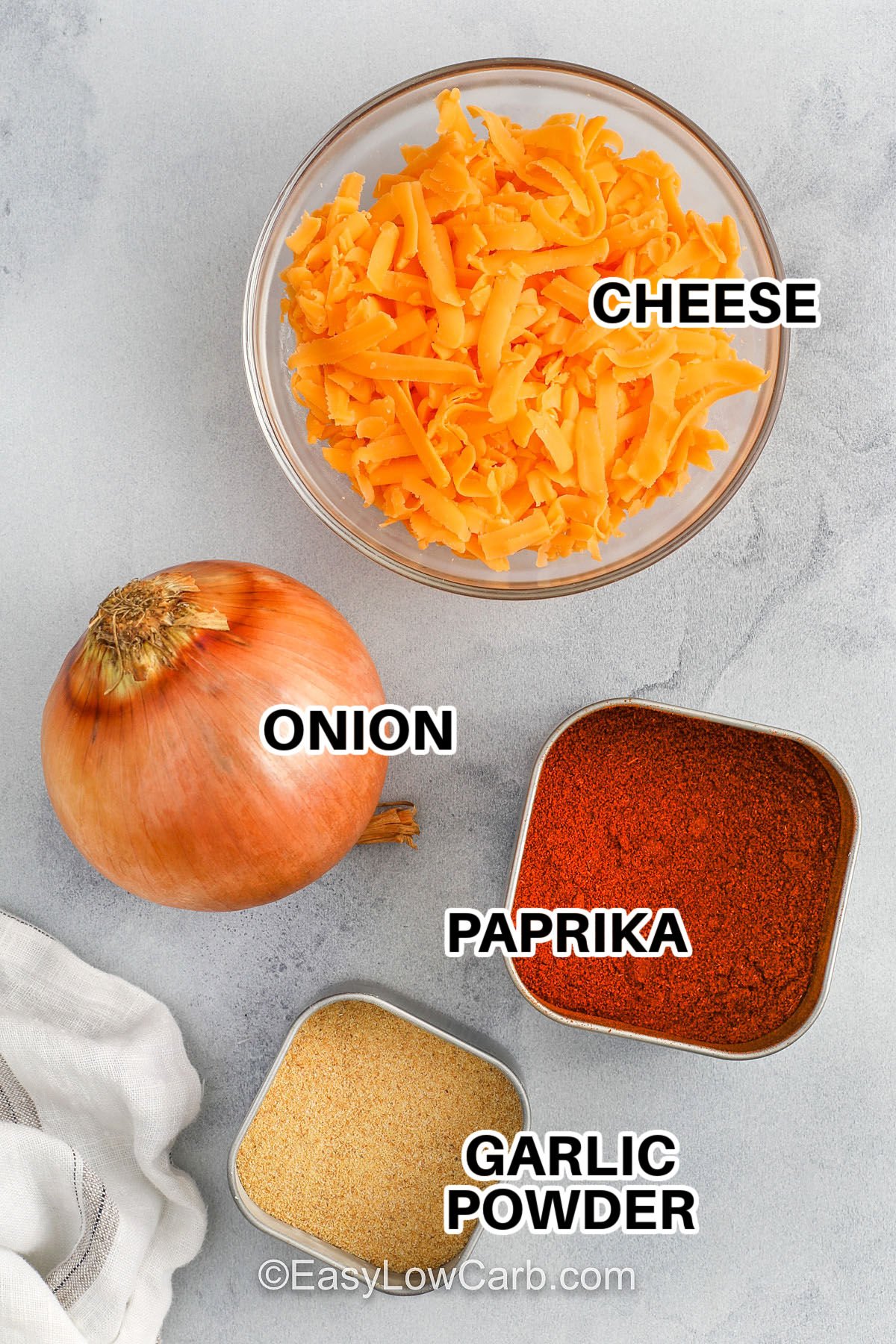 onion , cheese , paprika and garlic powder with labels to make Onion Cheese Chips