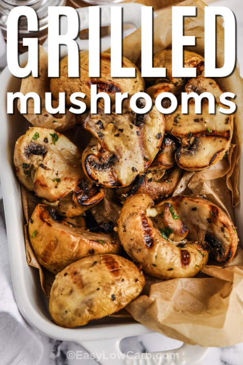 Grilled mushrooms make the best easy side dish with savory garlic, balsamic vinegar, and olive oil. These mushrooms are lightly marinaded for maximum flavor and grill up tender and juicy. Perfect for serving alongside a juicy steak or adding to a BBQ platter. This vegetarian-friendly recipe is full of flavor and ready in minutes. #easylowcarb savory Grilled Mushrooms in a dish with a title