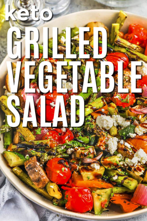 keto Grilled Vegetable Salad in a bowl with writing