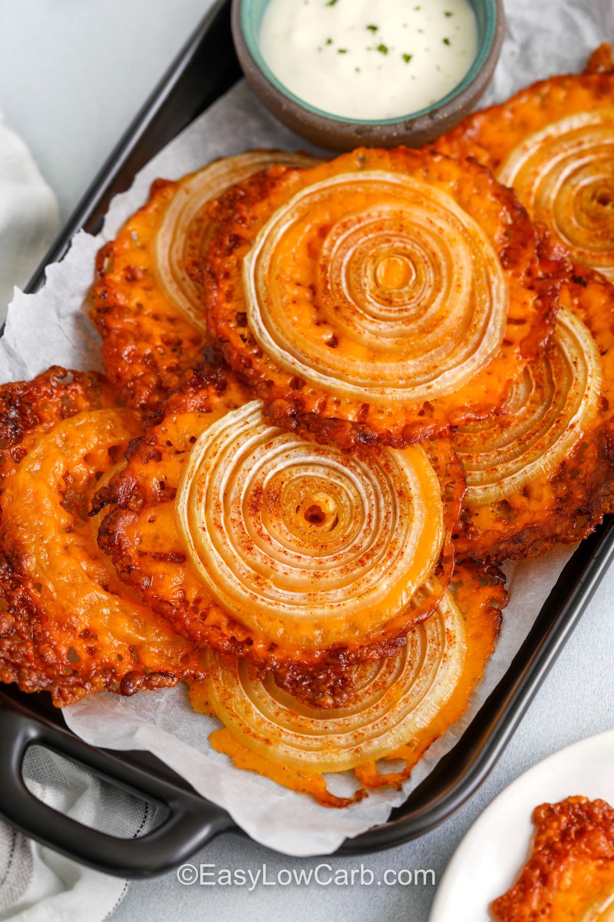 plated Onion Cheese Chips with dip