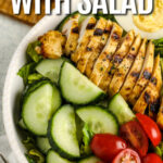 grilled chicken with salad recipe in a bowl with text