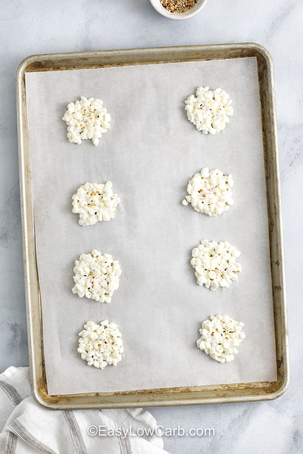 adding everything seasoning to cottage cheese to make Cottage Cheese Chips Recipe