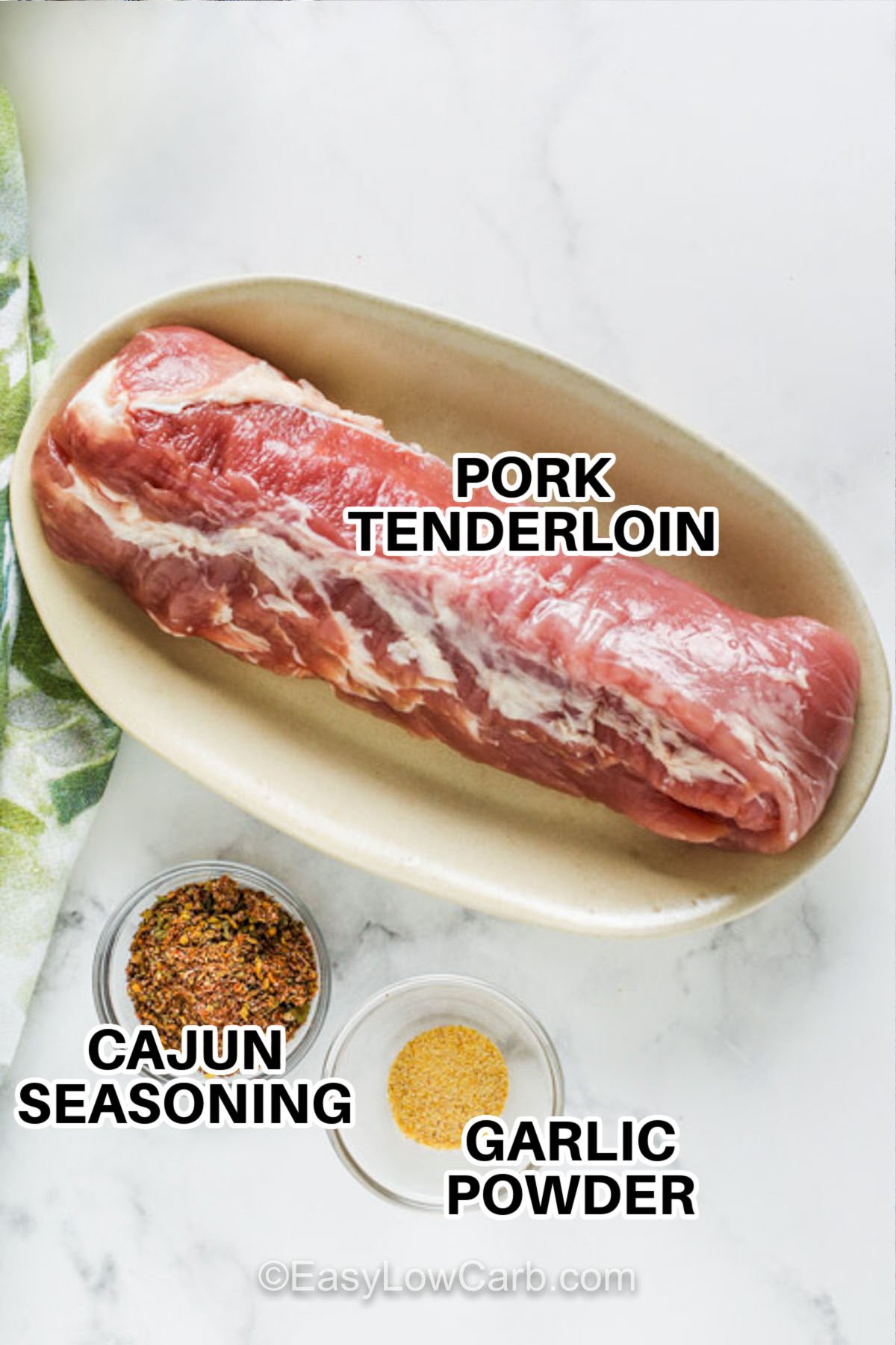 pork tenderloin , cajun seasoning , garlic powder with labels to make Cajun Pork Bites