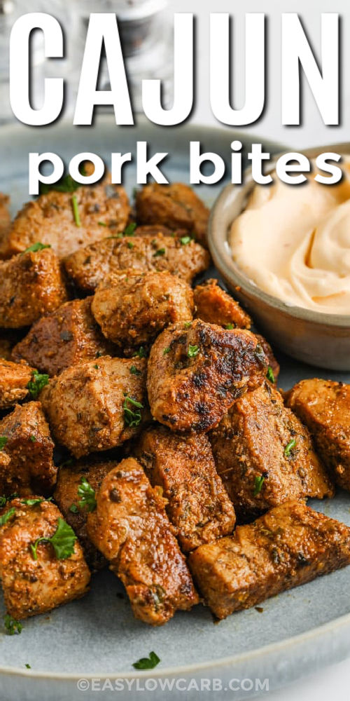 tender Cajun Pork Bites on a plate with writing