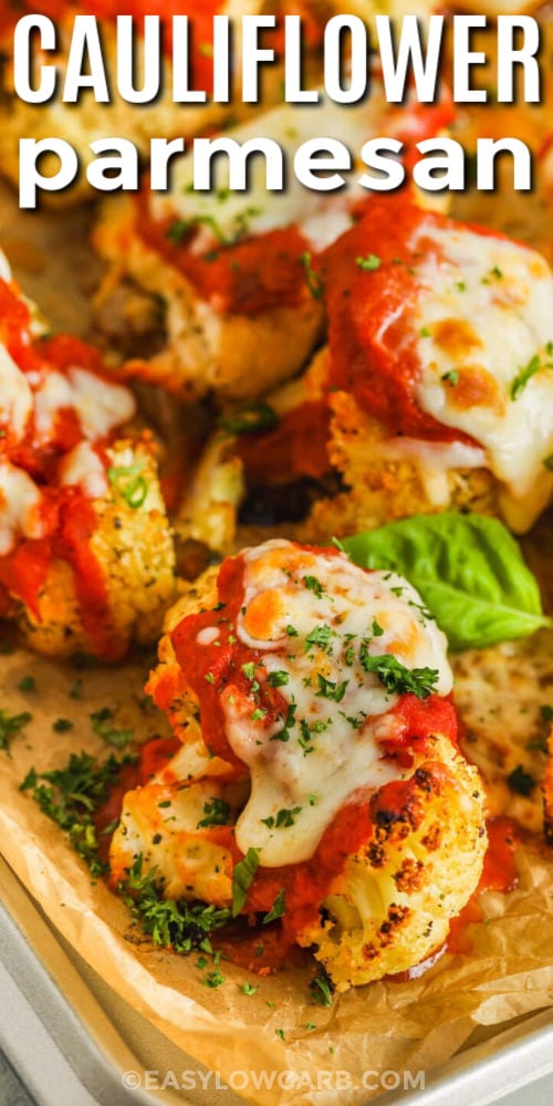 close up of baked Cauliflower Parmesan on a sheet pan with a title