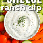 Top view of cottage cheese ranch dip on a platter with raw vegetables and a title