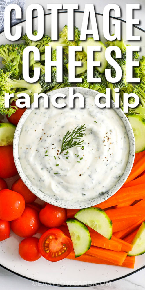 Top view of cottage cheese ranch dip on a platter with raw vegetables and a title