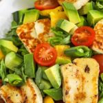 close up of plated Halloumi Salad with a title