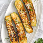 plated Zucchini Steaks with parmesan