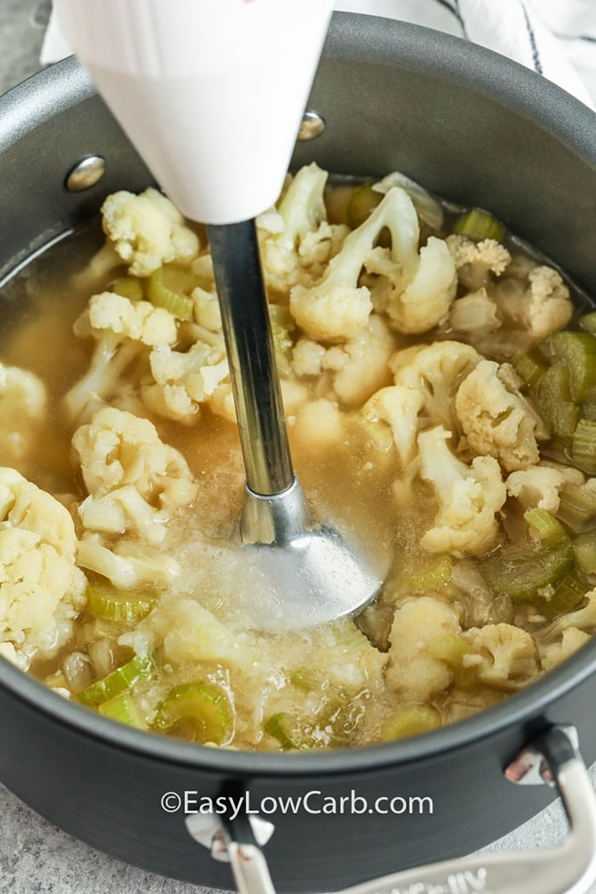 blending ingredients to make Creamy Cauliflower Soup
