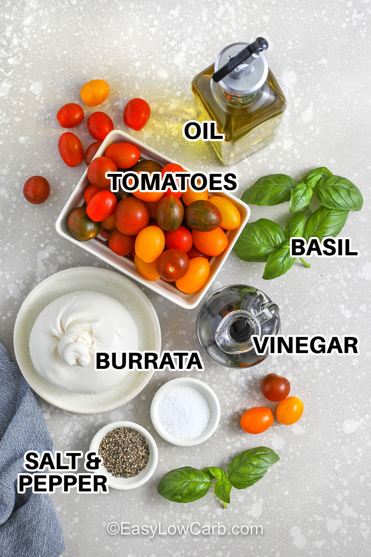 Tomato burrata salad is the perfect dish for warm days, combining sweet tomatoes with creamy burrata and fragrant basil. No cooking needed! This fresh and flavorful recipe takes minutes to prepare, making it ideal for quick lunches or elegant starters. A drizzle of olive oil and balsamic adds richness, while flaky salt and black pepper bring out the best in every bite. You’ll love how simple and satisfying it is! #easylowcarb tomatoes , oil , basil, vinegar , burrata , salt and pepper with labels to make Tomato Burrata Salad