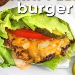 close up of Lettuce Wrapped Burger with writing