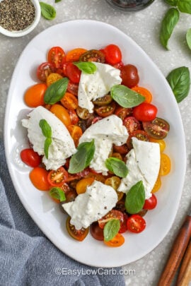 top view of Tomato Burrata Salad on a plate