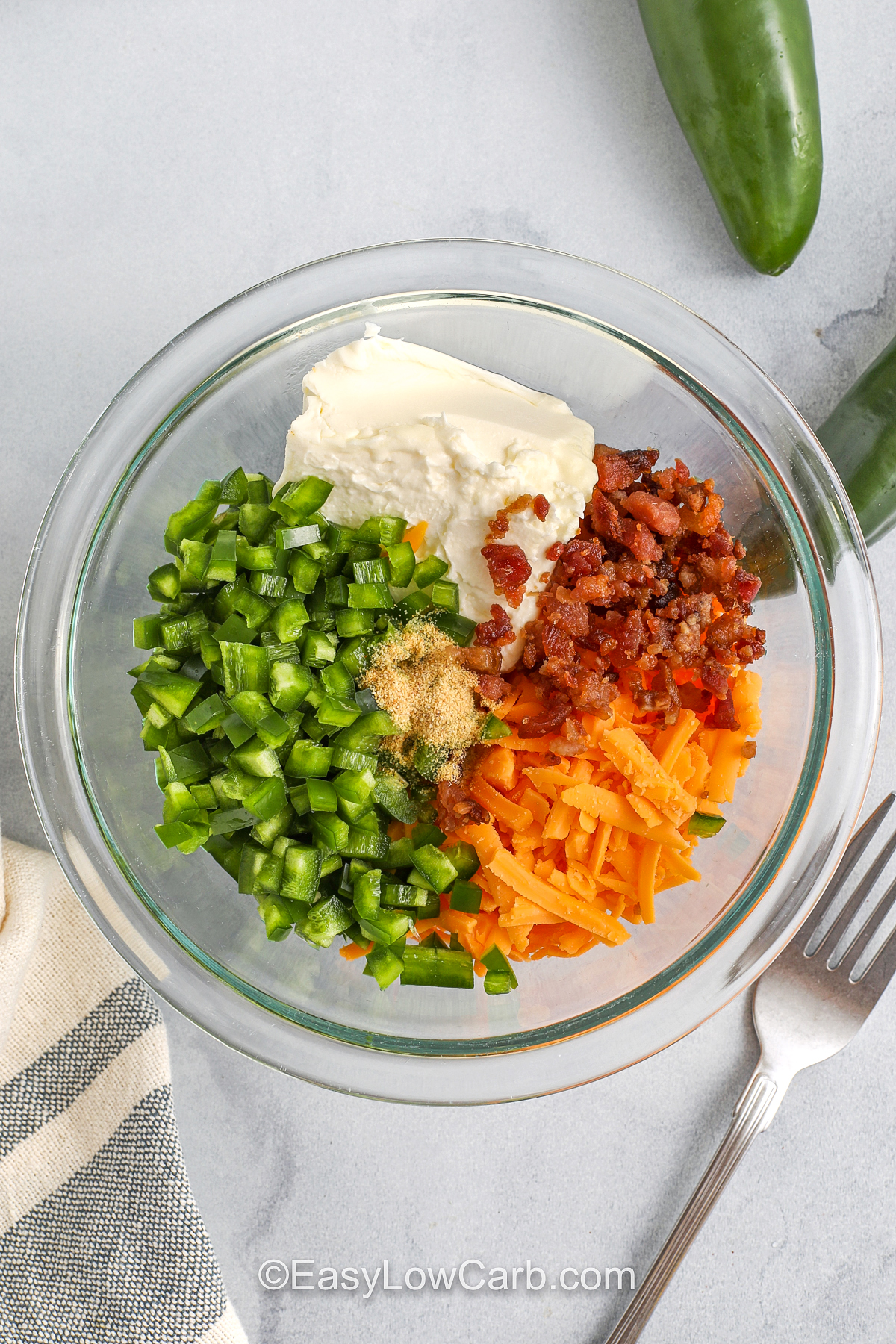 Ingredients to make the jalapeno popper chicken filling in a bowl