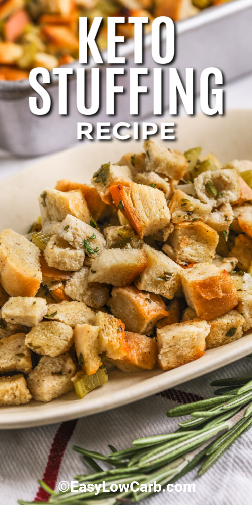 Keto stuffing takes the classic holiday favorite and turns it into a low carb delight. Toasted keto bread cubes are mixed with tender sautéed onions and celery, aromatic poultry seasoning, fresh parsley, and rosemary. Savory chicken broth keeps it moist while baking. This recipe is easy to make ahead for Thanksgiving or any holiday gathering, delivering all the comfort and flavor of traditional stuffing without the carbs. #easylowcarb A serving dish with keto stuffing with a title