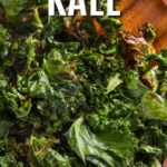Roasted kale being made on a baking sheet with a title