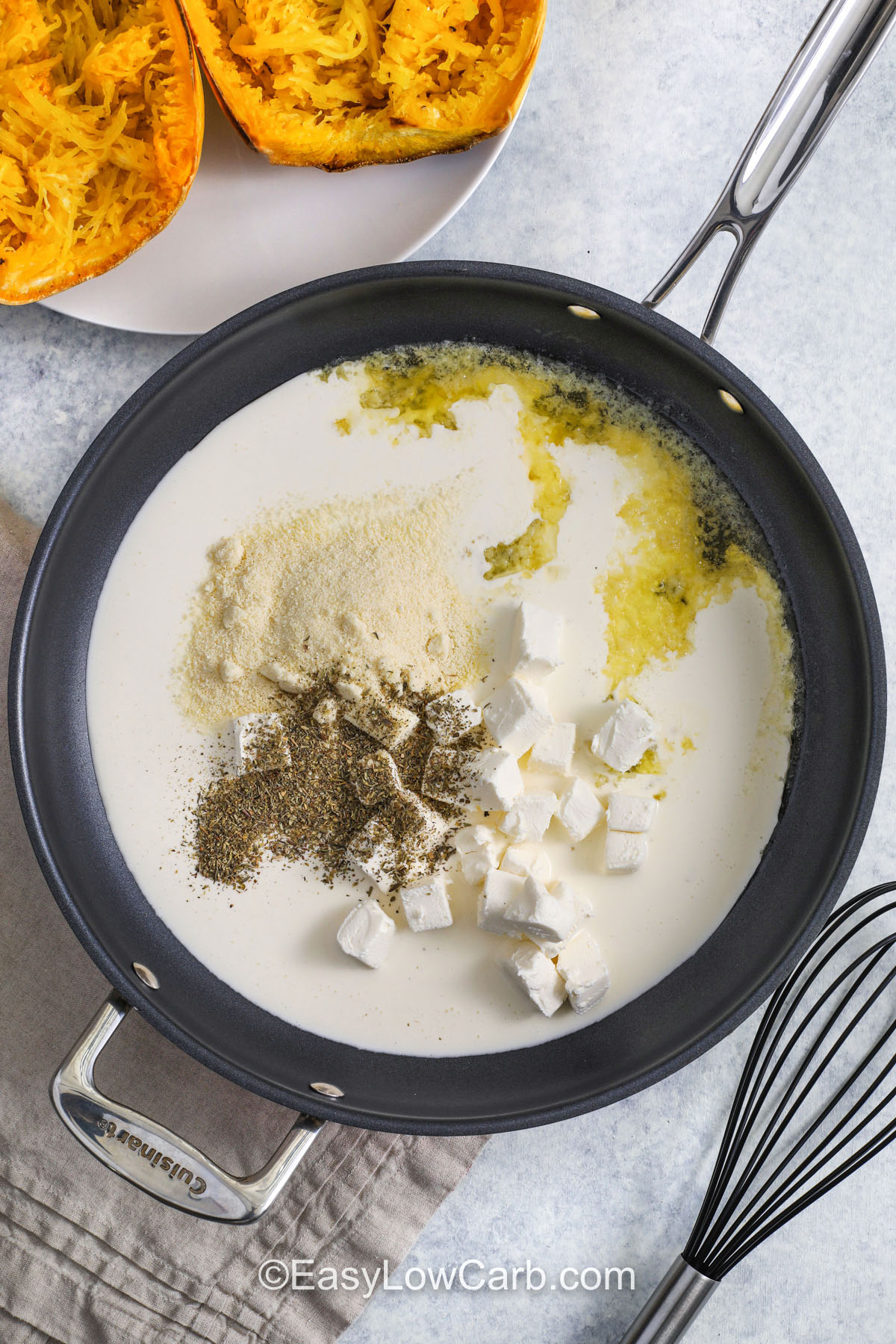 Spaghetti squash chicken Alfredo offers everything you love about Alfredo pasta with none of the carb overload. The squash strands mimic noodles beautifully, holding creamy sauce made from butter, cream cheese, and Parmesan. Topped with mozzarella and parsley, it bakes into a golden, bubbly masterpiece that tastes indulgent yet fits a balanced lifestyle. #easylowcarb adding ingredients to pan to make sauce for Spaghetti Squash Chicken Alfredo