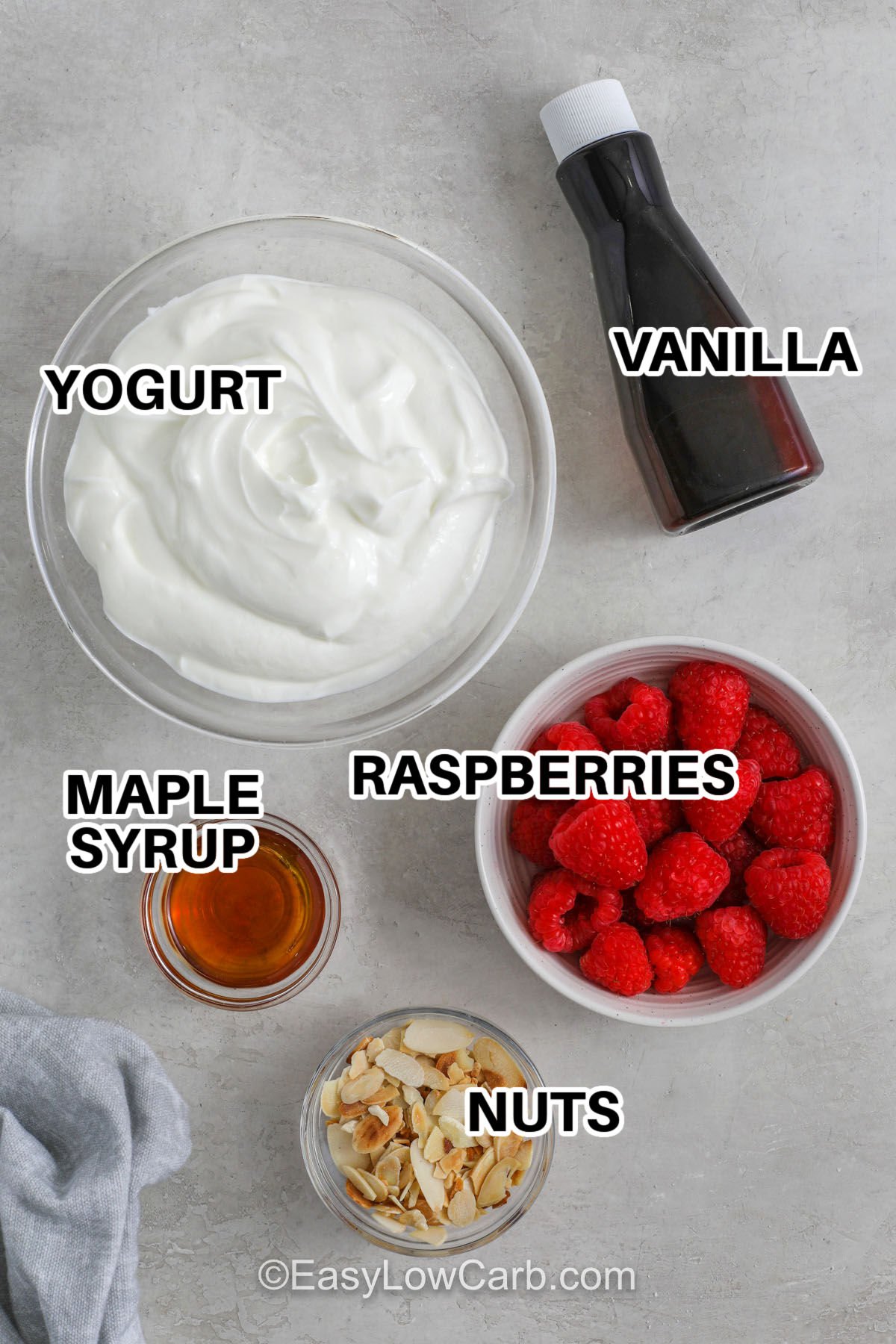 yogurt , vanilla , raspberries , maple syrup , nuts with labels to make Greek Yogurt Bark