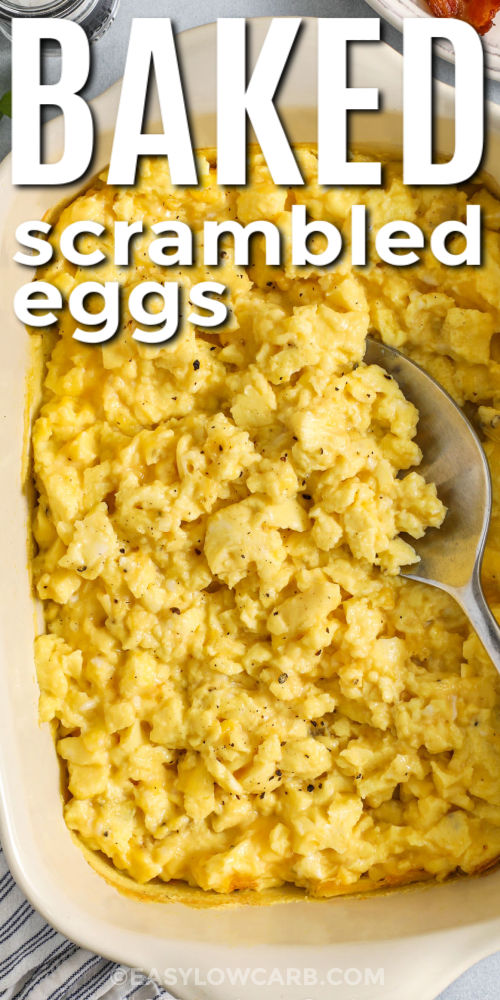 Baked scrambled eggs offer a protein-rich, low-carb dish that works for breakfast or brunch and brings warm flavor to the table. This easy recipe uses the oven to cook the eggs in a pan so you can serve a crowd with ease. Add cheese or your favorite seasoning to make the dish even better. It is also great as a make-ahead option for busy days when simple meals help keep things running smoothly. #easylowcarb close up of Baked Scrambled Eggs in a casserole dish with a spoon and a title
