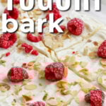 close up of Greek Yogurt Bark with raspberries with writing
