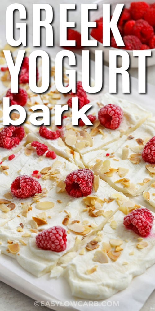 close up of Greek Yogurt Bark with raspberries with writing