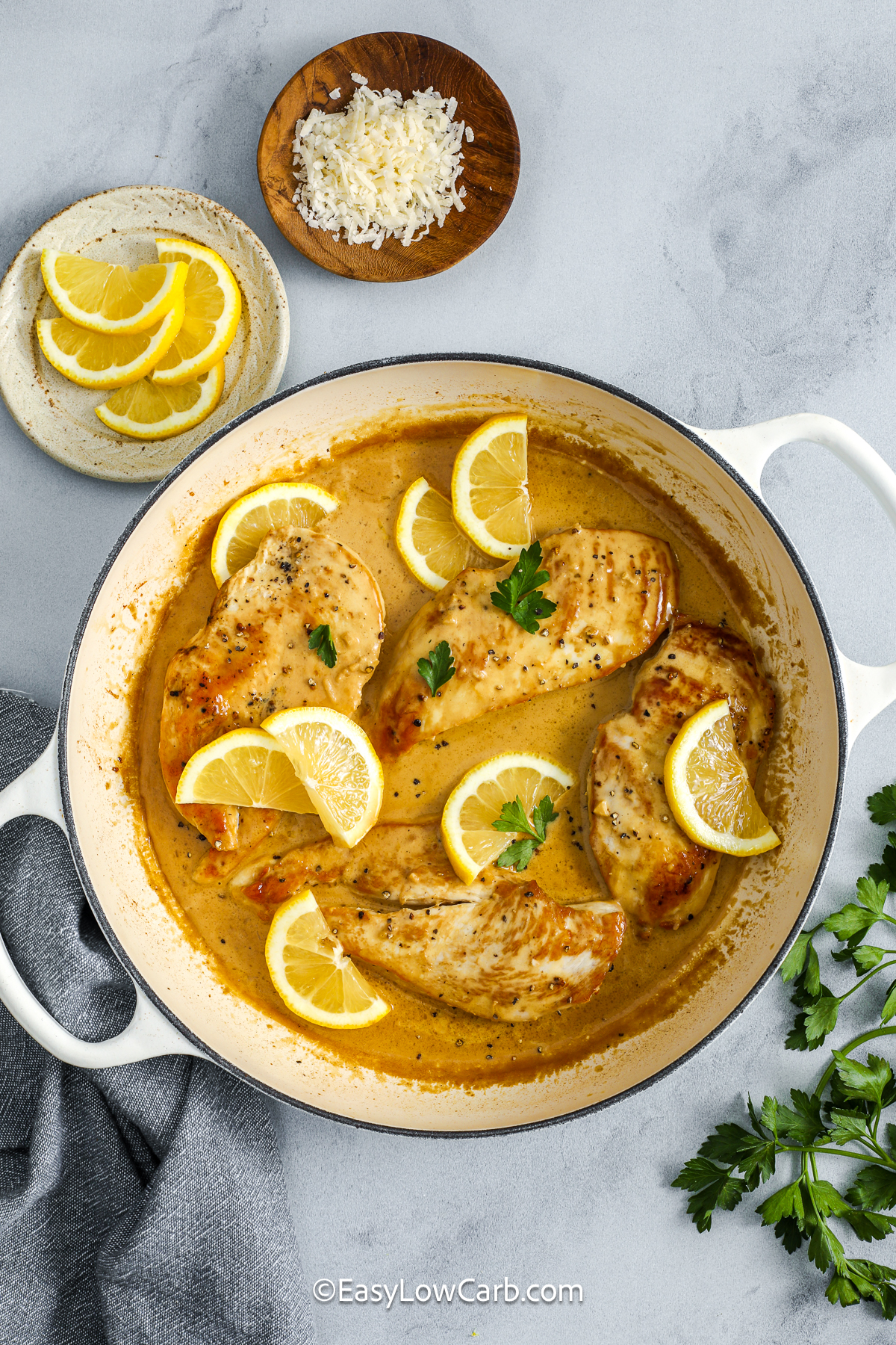 Creamy lemon chicken is a go to skillet recipe for busy nights because it only uses one pan and cooks in about 30 minutes. Fresh lemon zest and juice keep the cream sauce tangy, while garlic and Dijon bring savory flavor to every bite of chicken. The sauce naturally clings to low carb sides like roasted cauliflower, green beans, or zucchini noodles. It also reheats beautifully, making it perfect for meal prep or next day lunches. #easylowcarb creamy lemon chicken in a pan