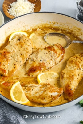 creamy lemon chicken and spoon in a dish