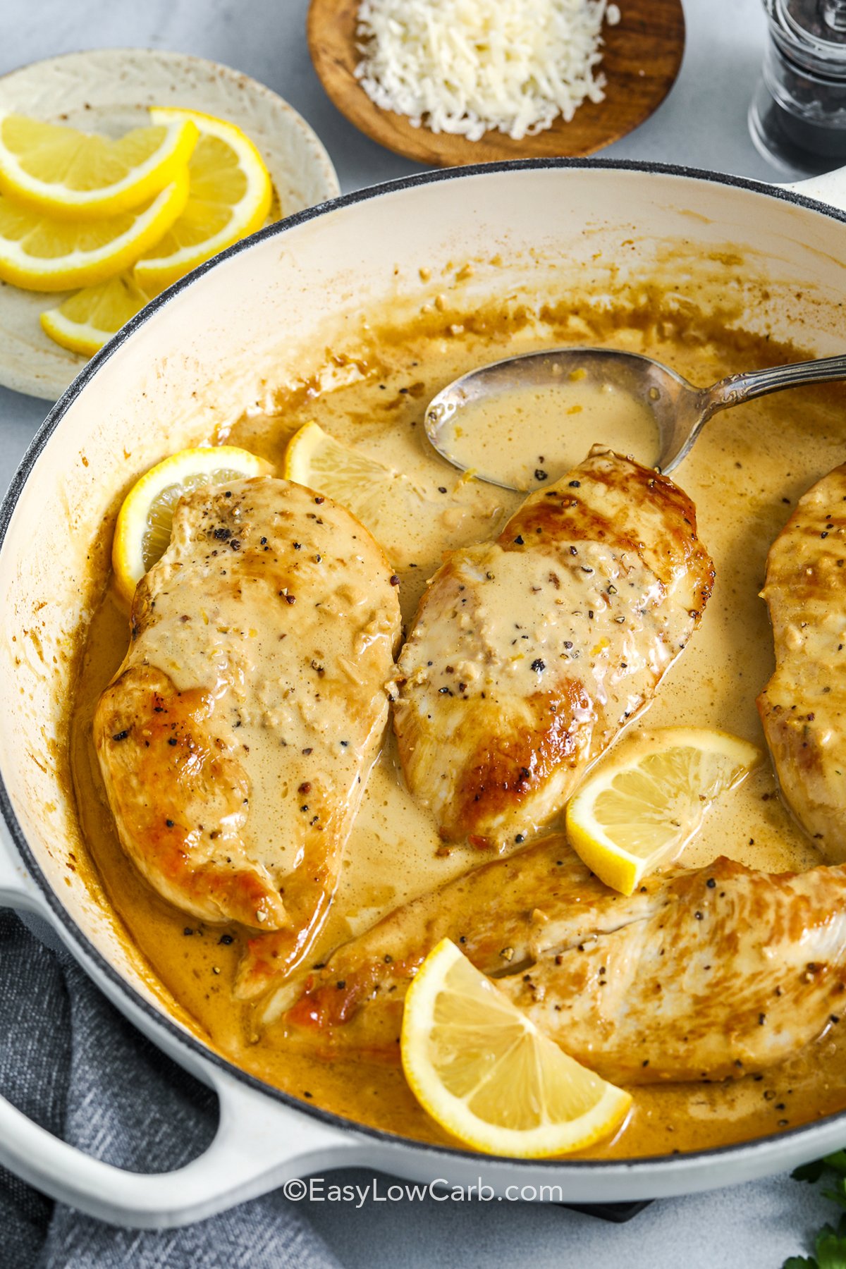Make this skillet creamy lemon chicken when you want a fast, flavorful dinner that fits a low carb lifestyle. Juicy chicken breasts are pounded thin so they cook quickly, then nestled into a lemon cream sauce that is full of garlic and a hint of Dijon. The heavy cream keeps the carbs down while delivering a silky texture. Spoon the sauce over sautéed spinach, cauliflower mash, or steamed broccoli to soak up every last drop. #easylowcarb cropped creamy lemon chicken