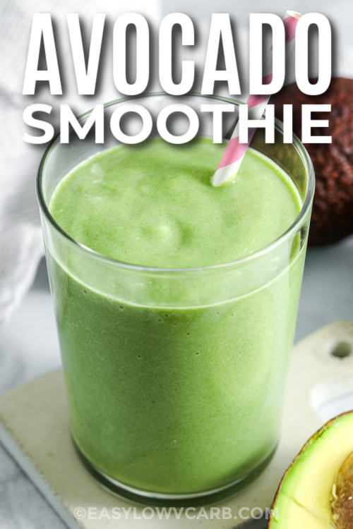 Enjoy a refreshing avocado smoothie made with spinach, almond milk, and sugar-free vanilla protein for a creamy and filling drink. The avocado adds richness, while the ice provides a cool, smooth finish. This smoothie is simple to customize and perfect for those looking for an easy, low carb breakfast option. It blends quickly and offers a delicious mix of flavor and texture that feels both light and satisfying. #easylowcarb avocado smoothie in a glass with text