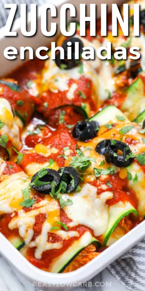 Enjoy hearty Tex-Mex flavor without the carbs from tortillas, with these keto zucchini enchiladas. Fresh zucchini is sliced into long strips, then wrapped around a warm chicken and enchilada sauce filling. A blend of sharp cheddar and Monterey Jack melts over the top, creating a cheesy crust that covers every roll. This recipe is easy enough for weeknights and works perfectly with leftover or rotisserie chicken to save time. #easylowcarb zesty Zucchini Enchiladas in the dish with a title