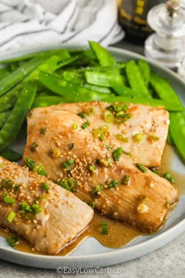 plated Baked Mahi Mahi Recipe with peas