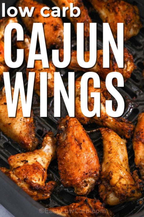 These Cajun wings cook up crispy and flavorful with a simple Cajun dry rub and a quick air fryer method. Patting the wings dry helps the skin brown and crisp, while the olive oil keeps the seasoning evenly coated. The garlic and Cajun seasoning bring bold, savory heat without any breading, making this a great low carb chicken wings option for weeknights or game day. #spendwithpennies cajun wings in a pan with writing