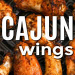 cajun wings in an oven safe pan with writing
