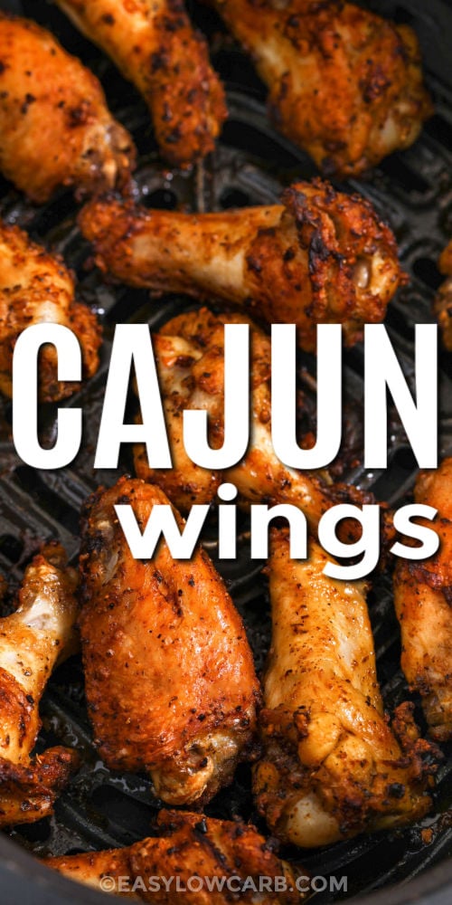 Cajun wings are the ultimate easy upgrade for wing night, delivering bold, smoky heat with crispy skin and no frying required. These oven or air fryer wings use a short ingredient list and simple prep for big flavor without the mess. Just toss, cook, and serve with your favorite dip for a crowd-pleasing appetizer or easy dinner that feels like takeout at home. #easylowcarb cajun wings in an oven safe pan with writing