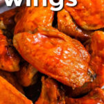 close up of Crockpot Chicken Wings with writing