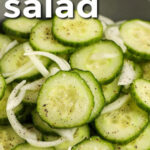 Cucumber and Onion Salad in a bowl with writing