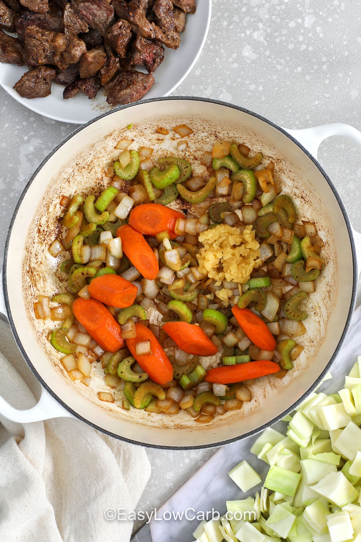 This beef and cabbage soup has a rich tomato-beef broth with savory Worcestershire and thyme. Searing the beef first builds deep flavor, then the soup simmers mostly hands-off until the meat is tender. Vegetable juice adds quick all-day taste, and cabbage makes the bowl filling while staying low carb. Portion leftovers for easy lunches, and reheat gently on the stove or in the microwave. #easylowcarb cooking vegetables to make Beef and Cabbage Soup